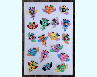 Your choice of 18 Winged Striped Hearts with Eyes and Flowers Clay Wall Hangings