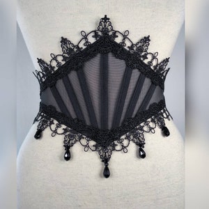 Waist-belt "Freesia". Gothic mesh corset waist-belt with pointed macramé lace and black glass teardrops. Adjustable & Light boned.