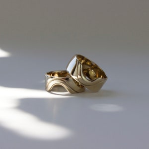 Gold abstract ring, monstera gap ring, plant inspired. Shot on a dappled white background. 
Made by L.Greenwalt Jewelry of Portland, OR.