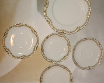 One Haviland Limoges 7 1/4" Plates, Three 5 1/4" Saucers, One 4 3/4" Demitasse Saucer*