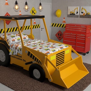 May include: A yellow construction-themed bed shaped like a bulldozer, with black wheels and a black roof. The bed has a matching patterned comforter and pillow. The room is decorated with construction signs and a red toolbox.