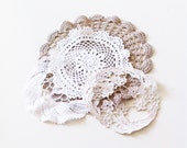 Set of hand embroidered doilies.