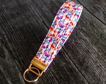 Gold key fob wristlet dainty floral blue red pink keychain