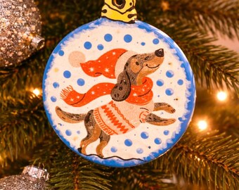 Dachshund / wiener dog with scarf and sweater ornament