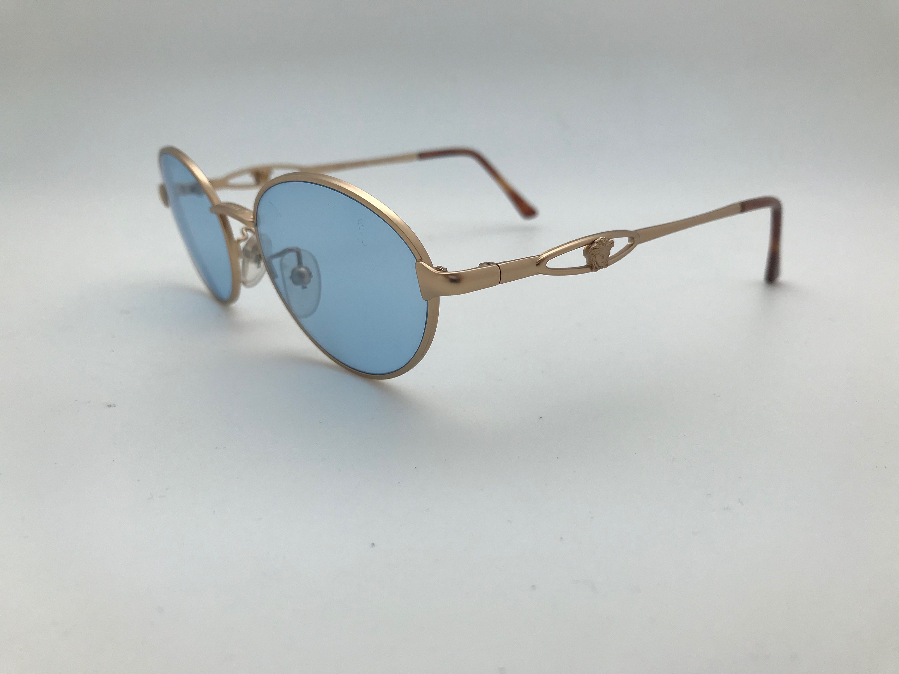 Versace Gold and Blue Sunglasses with Iconic Design Amazon.com: Versace VE 2245 100280 Gold Metal Rectangle  main image 2