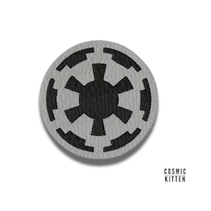 May include: A gray and black embroidered patch featuring the iconic Star Wars Imperial symbol.