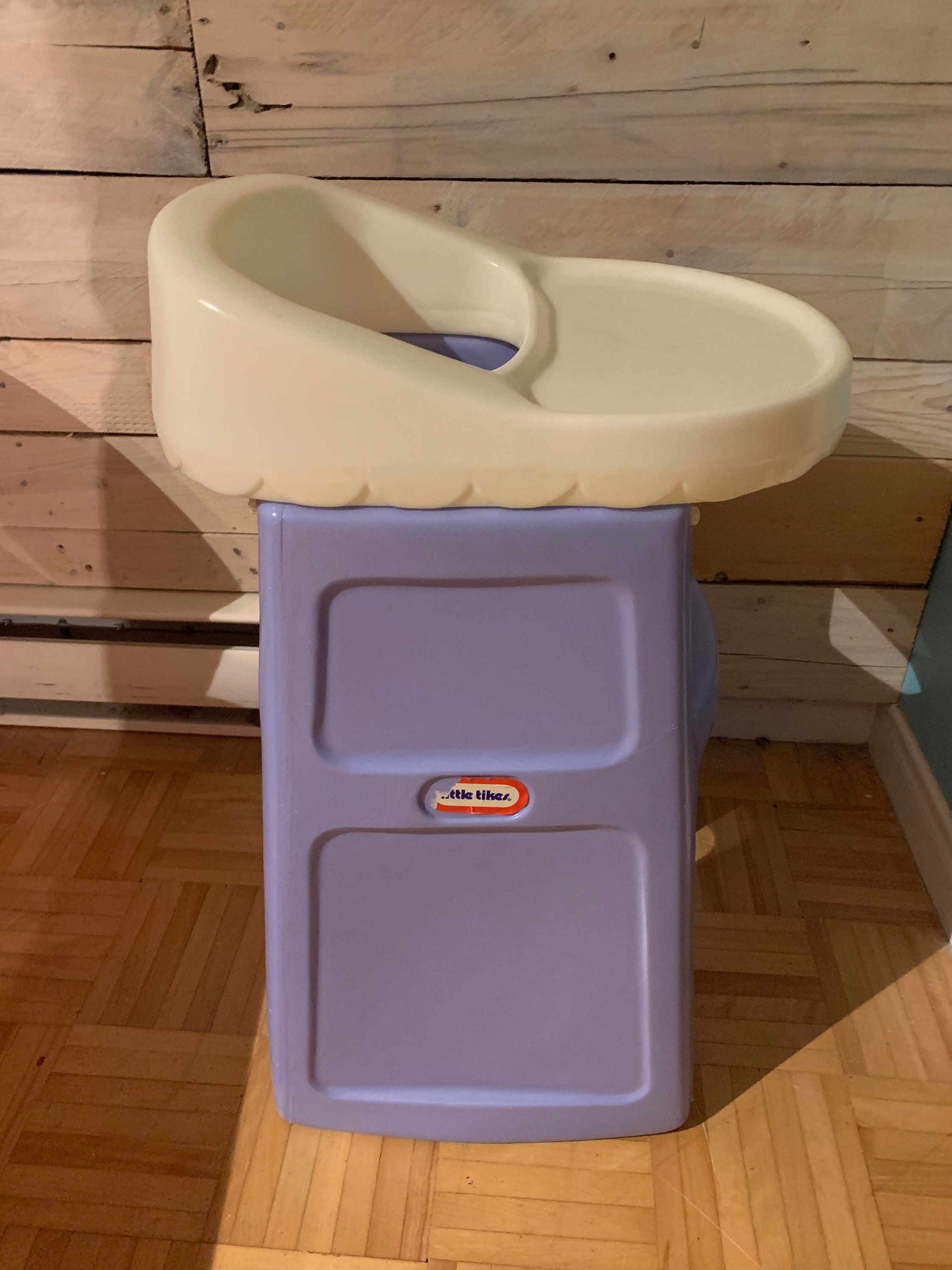 Little tikes baby doll bed sales