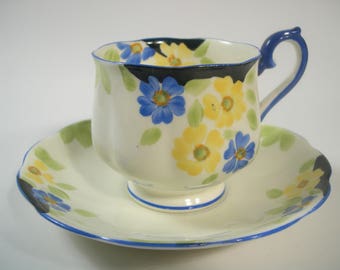 Rare 1930's Royal Albert  Tea Cup And Saucer,  Yellow Tea Cup and Saucer, Hand Painted Yellow and Royal Blue Flowers.