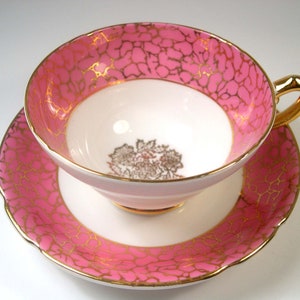 Vintage Stanley   Pink & White  Cup And Saucer with gold design .