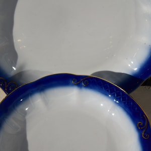 Bowls, plate cobalt blue edge / Vintage cereal bowls and one serving plate with cobalt blue rim