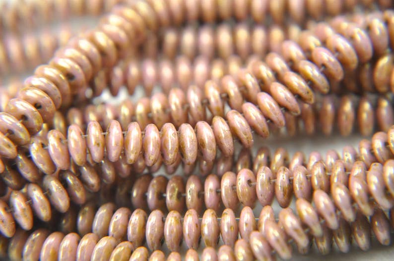 50 Rosetan 2-hole lentil beads 6mm luster opaque rosegold topaz
