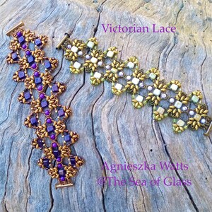May include: Two beaded bracelets with a Victorian lace design. One bracelet features purple and gold beads, while the other has white, green, and gold beads. The bracelets are displayed on a weathered wooden surface. The text "Victorian Lace" and "Agnieszka Watts @The Sea of Glass" are visible.