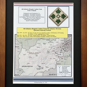 May include: Framed print featuring a map of Afghanistan and Pakistan, with text detailing the 4th Infantry Brigade Combat Team's Order of Battle and Operation Enduring Freedom. Includes a unit patch with green and tan colors. The frame is a dark wood.