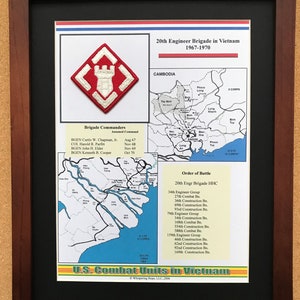 May include: Framed print of the 20th Engineer Brigade in Vietnam, 1967-1970. Includes a map of the region, the brigade's patch, and a list of commanders and the order of battle. The text "U.S. Combat Units in Vietnam" is at the bottom.