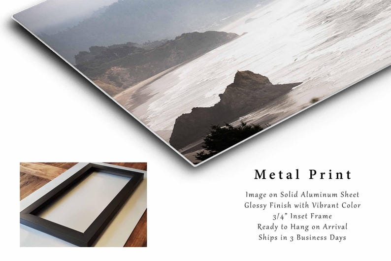May include: A metal print of a seascape with a rocky coastline and a misty sky. The print has a glossy finish and is framed with a 3/4 inch inset frame.