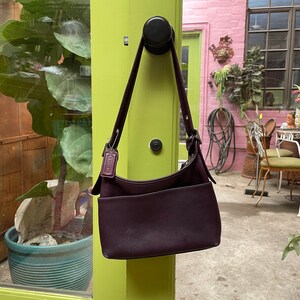 Dark purple coach purse clearance