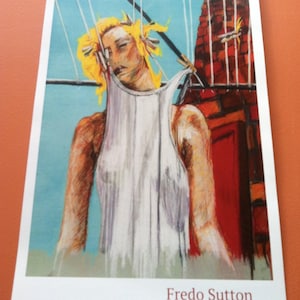 May include: A painting of a woman with blonde hair wearing a white tank top. The woman is standing in front of a brick wall with a red door. The painting is titled "Fredo Sutton".