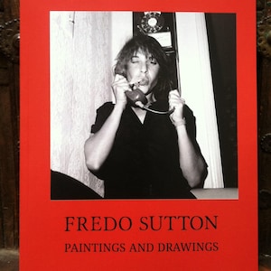 May include: A black and white photo of a woman on a red background. The woman is wearing a black shirt and is on the phone. The text "FREDO SUTTON PAINTINGS AND DRAWINGS" is printed below the photo.