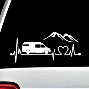 May include: White silhouette of a camper van with mountains and a heart beat graphic. The graphic reads "I love camping".