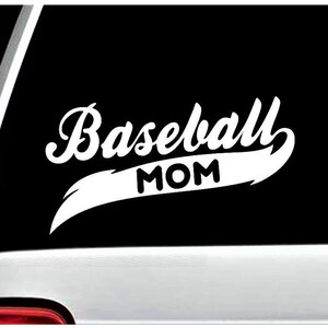 May include: White vinyl decal with the text "Baseball Mom" in a cursive font. The text is on a white curved line.