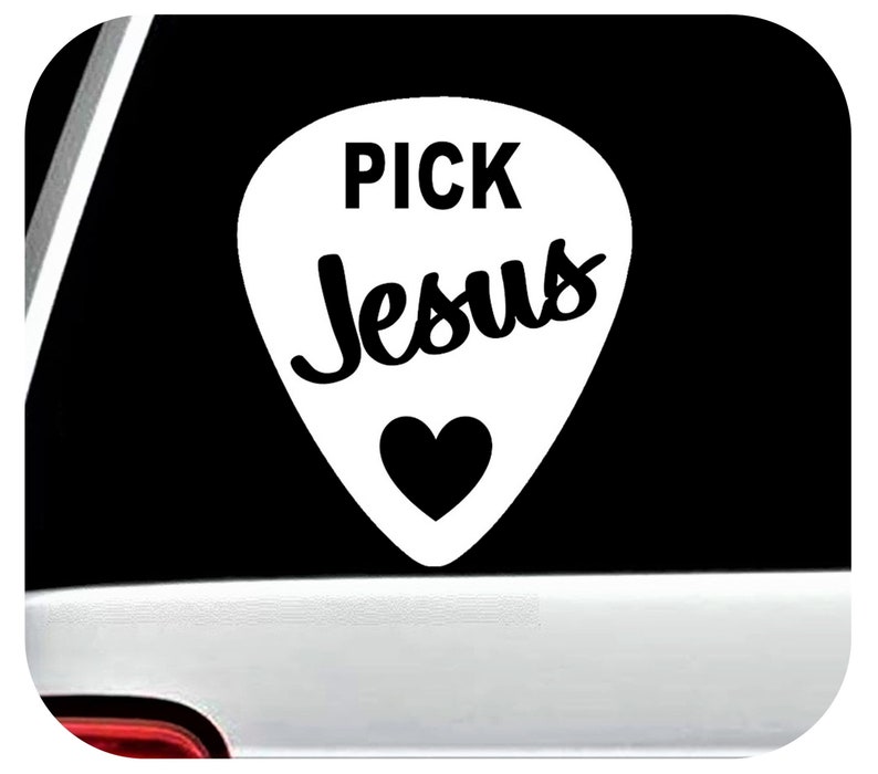 May include: White guitar pick shaped decal with the text "PICK Jesus" in black lettering and a black heart in the center.
