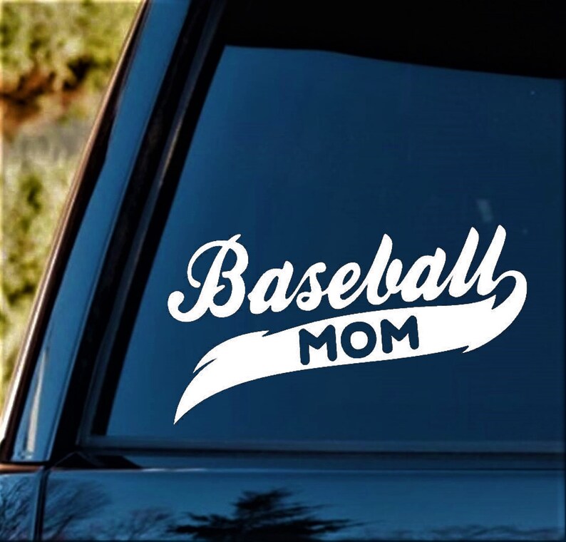 May include: White vinyl decal with the text "Baseball Mom" in a white cursive font on a blue background.