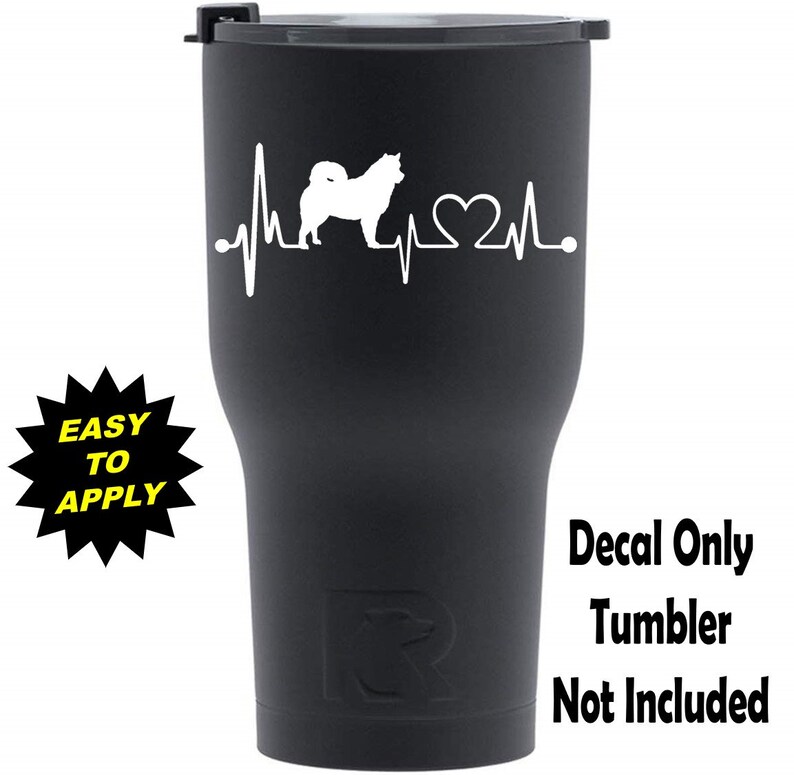 May include: Black tumbler with a white decal of a dog silhouette with a heartbeat and heart. The text "Decal Only Tumbler Not Included" is printed below the image.  The words "Easy to Apply" are printed on a yellow starburst.