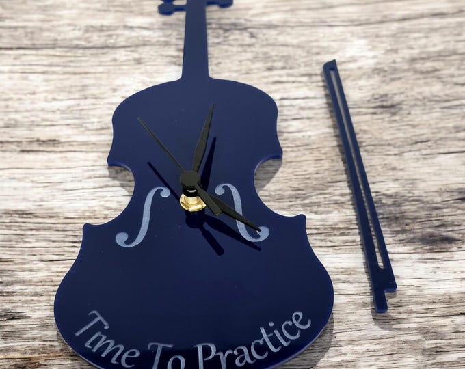 Violin Shaped Clocks - Custom colours and Woods. Engraving and Bespoke Shapes & Sizes Made