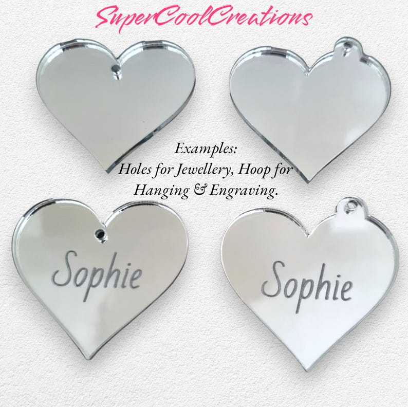 May include: Four silver mirror heart-shaped acrylic blanks with holes for hanging or jewelry making. The blanks are shown with the text "Sophie" engraved on two of them. The text "Examples: Holes for Jewellery, Hoop for Hanging & Engraving" is also shown.