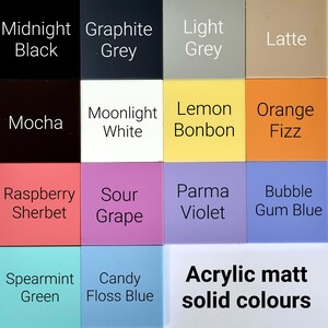 May include: A color chart showing 16 acrylic paint colors in a 4x4 grid. The colors are: Midnight Black, Graphite Grey, Light Grey, Latte, Mocha, Moonlight White, Lemon Bonbon, Orange Fizz, Raspberry Sherbet, Sour Grape, Parma Violet, Bubble Gum Blue, Spearmint Green, Candy Floss Blue, and Acrylic Matt Solid Colors.