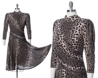 Vintage 1980s Dress | 80s Leopard Animal Print Jersey Draped Drop Waist Long Sleeve Circle Skirt Fall Winter Dress (medium)