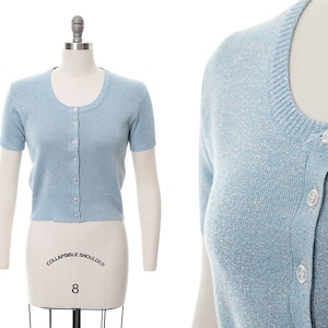 Vintage 1960s Sweater | 60s Metallic Silver Light Blue Knit Short Sleeve Button Up Top (small/medium)