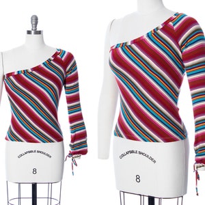 Vintage Y2K Top | 2000s One Single Sleeve Striped Jersey Knit Colorful Cold Shoulder Long Sleeve Shirt (x-small/small)