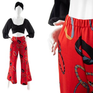 Vintage 1970s Wide Leg Pants | 70s Bangle Bracelet Circle Novelty Print Red Jersey Knit High Waisted Lounge Pants (small/medium/large)