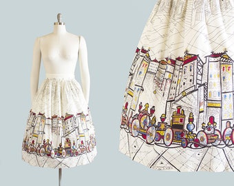 Vintage 1950s Skirt | 50s SAUL STEINBERG "Trains" Novelty Print Cotton White Full Skirt (small)