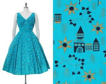 Vintage 1950s Sundress | 50s Novelty Print Cotton Metallic Buildings Suns Blue Fit and Flare Circle Skirt Day Dress (small)