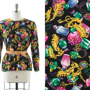 Vintage 1980s Blouse | 80s Perfume Bottles Gems Novelty Print Black Jewel Tone Long Sleeve Top (medium/large)
