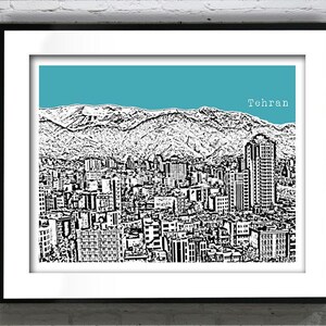 May include: Black and white cityscape art print of Tehran, Iran, with a teal sky and the city's name in white. The print features a detailed illustration of buildings and mountains.