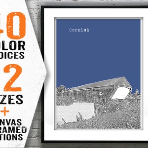 May include: Framed art print featuring a black and white illustration of a covered bridge against a blue background. The word "Cornish" is at the top. The left side of the frame has text that reads "40 COLOR CHOICES, 12 SIZES + CANVAS & FRAMED OPTIONS."