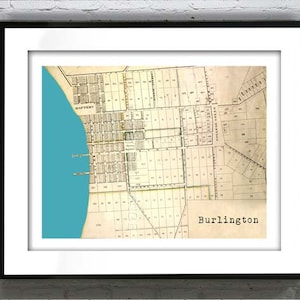 May include: An antique map of Burlington, Vermont, with a blue water feature and the text "BATTERY" and "Burlington".