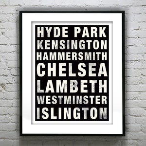 May include: Black and white typography print featuring the names of London neighborhoods: Hyde Park, Kensington, Hammersmith, Chelsea, Lambeth, Westminster, and Islington.