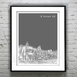 May include: A black and white illustration of a street scene in Washington, D.C. The illustration depicts a row of buildings with storefronts and windows. The text "H Street NE" is printed at the top of the image.