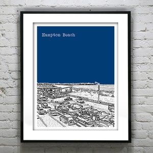 May include: Black framed print featuring a Hampton Beach illustration. The artwork depicts a detailed grayscale scene of a beach town with cars, buildings, and a deep blue sky. The words "Hampton Beach" are at the top.