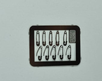 12th scale Nappy Pins   by Ironwork and Black Country miniatures.  IRNP