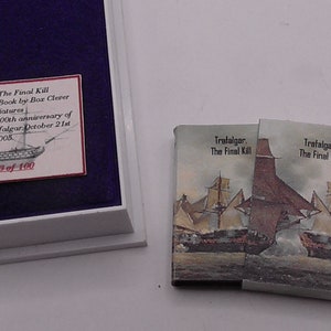 May include: A limited edition book titled "Trafalgar: The Final Kill" by Bor Clever Miniatures. The book celebrates the 200th anniversary of the Battle of Trafalgar, which took place on October 21st, 2005. The book is number 13 of 100.