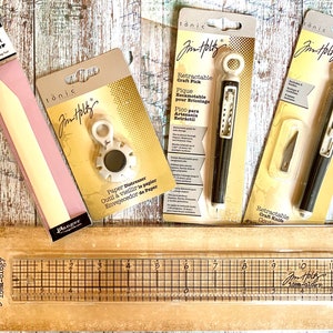 Tools Tim Holtz/ Ranger/ Tonic Studio:  Paper Distresser, Paper Creaser, Craft Knife, Craft Pick, Design Ruler,