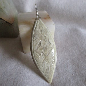 Vintage HAND CARVED Pendant image 1