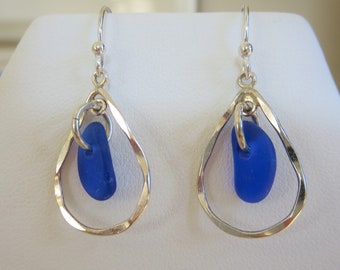 Unique sea glass earrings on a hammered sterling silver oval ring by Monterey Bay Sea glass in cobalt blue and green