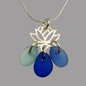 Unique shades of blue sea glass necklace on a sterling silver lotus flower necklace