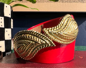 1980's Gold Paisley Belt Buckle by Mimi Di Niscemi On Red Patent Vinyl High Waisted Belt